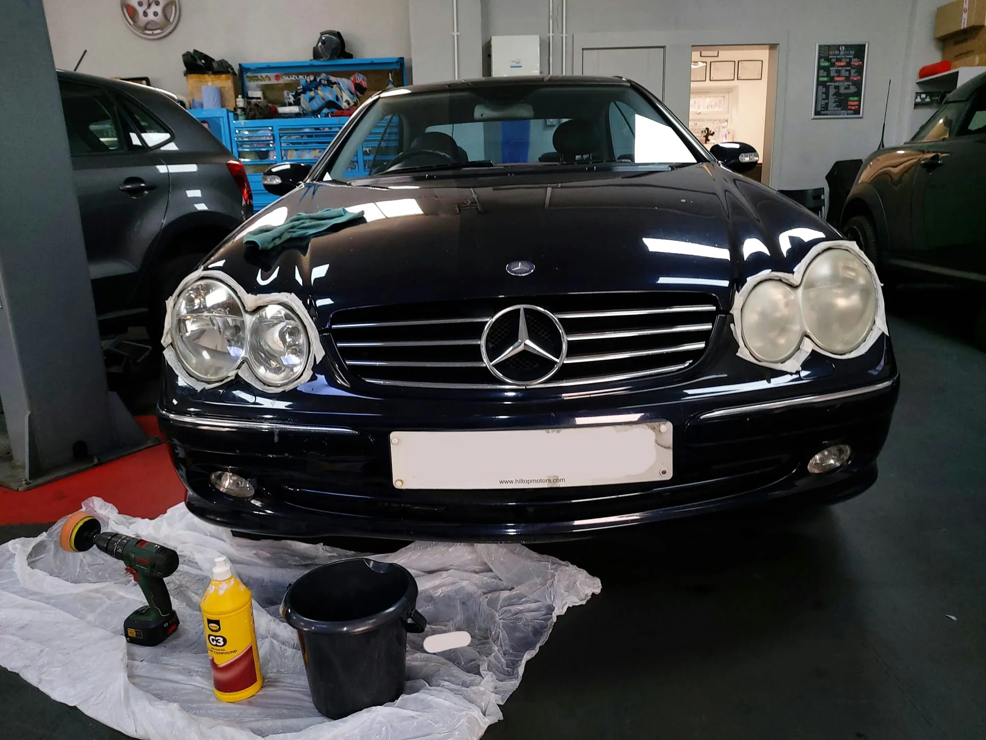 black car with tools